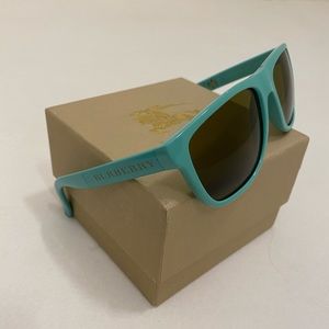 Authentic Burberry foldable sunglasses in blue. NWT, in box, w/ accessories.